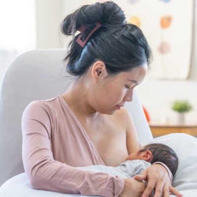 Bring baby up to you with pillows